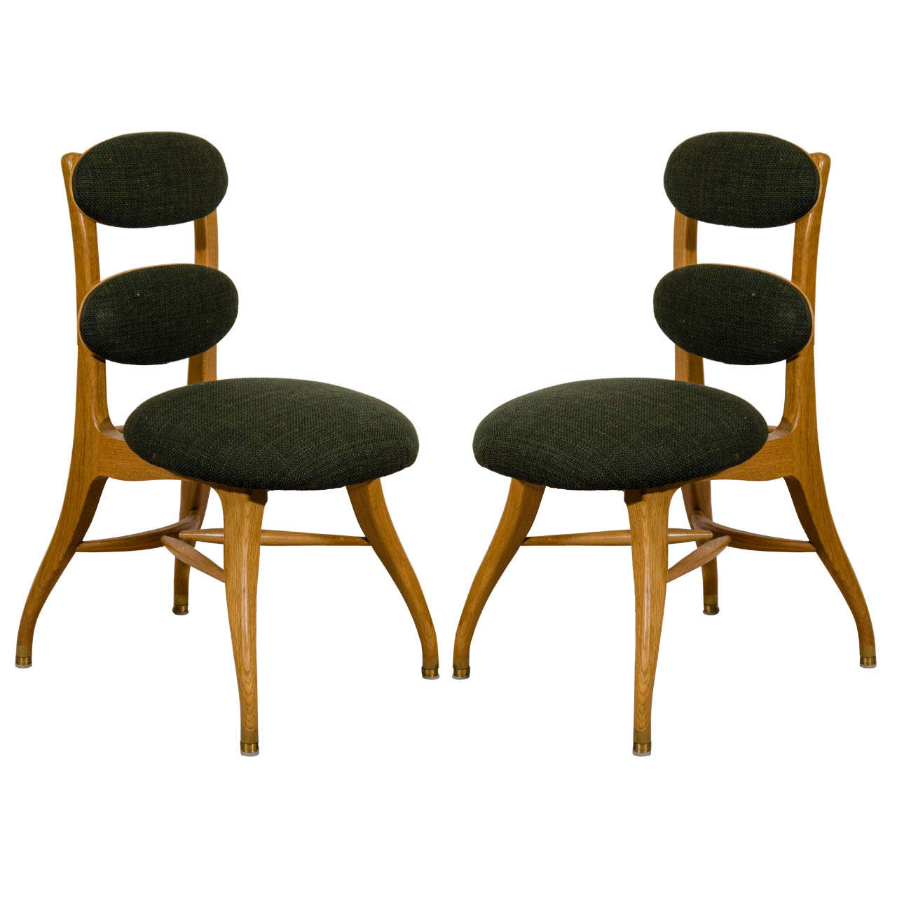 A Mid Century Set of Four Wooden Sculptural Dining Chairs by Poul