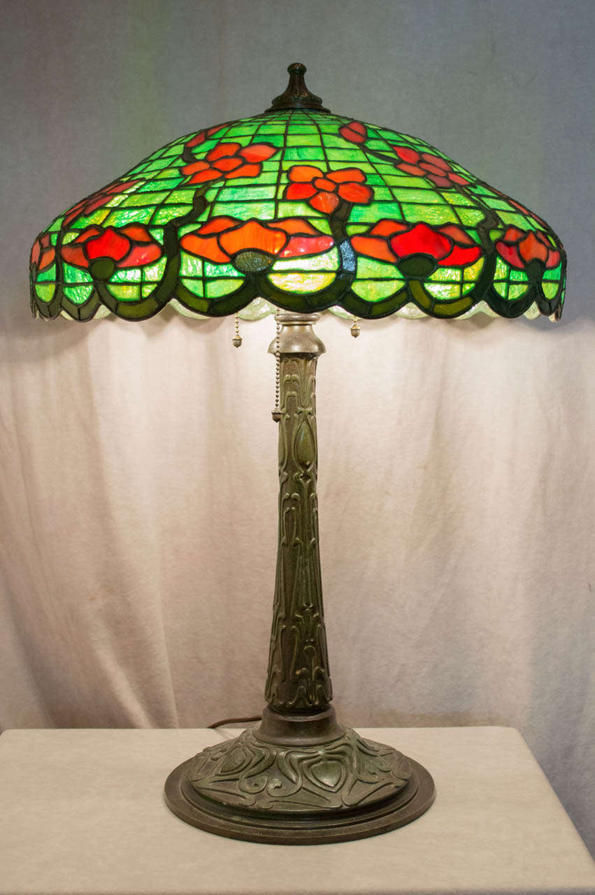 This very well constructed and handsome leaded glass table lamp was produced by the noted company Gorham, which also was famous for making some of the best American silver, as well as casting some of the finest American bronzes.  This lamp has very