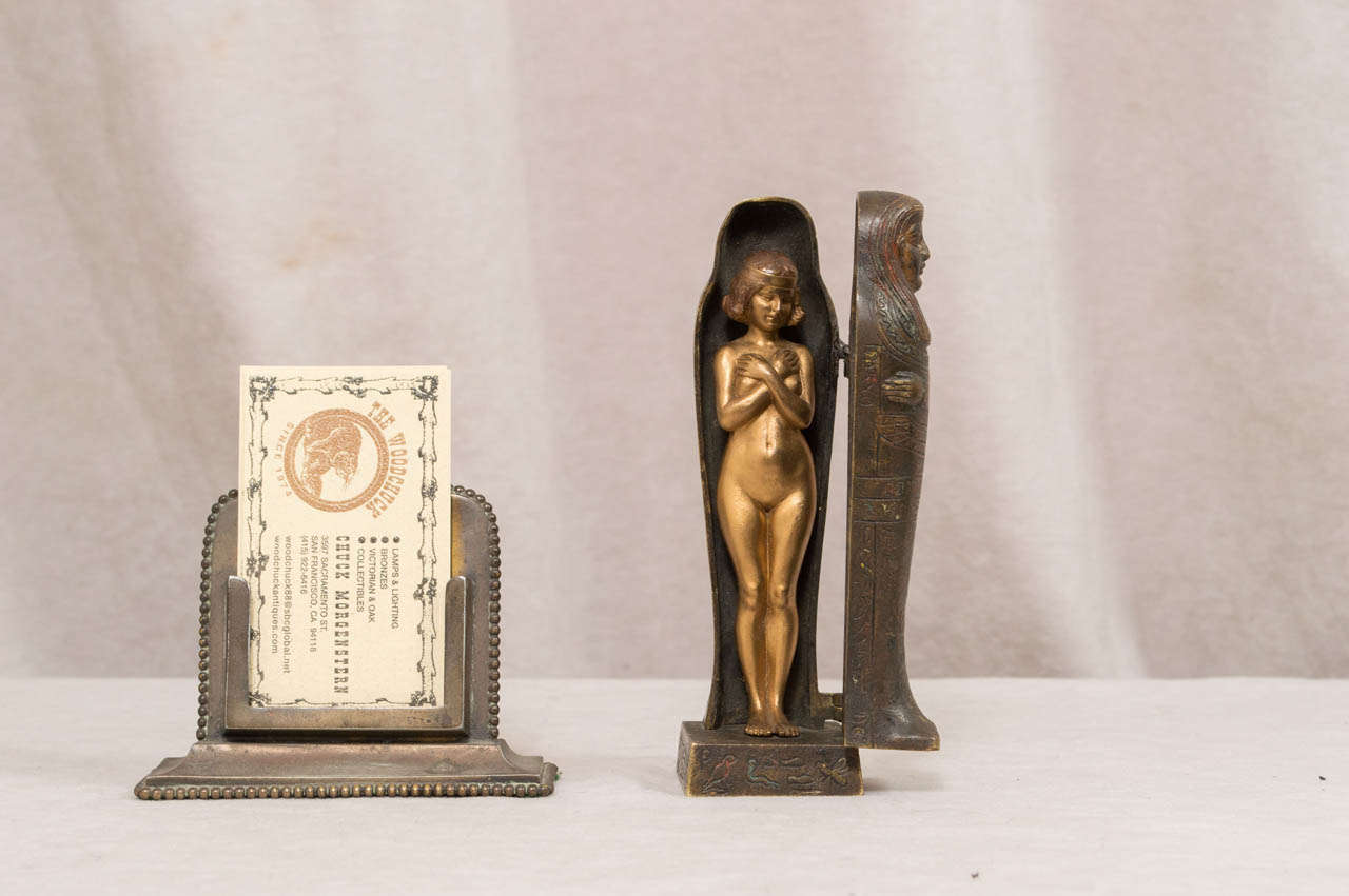 This cold painted Vienna bronze falls into the category of highly collectible, as you can open and close the mummy to reveal the naked woman inside.  This piece actually comes in two sizes; this is the harder-to-find smaller version.  We know this