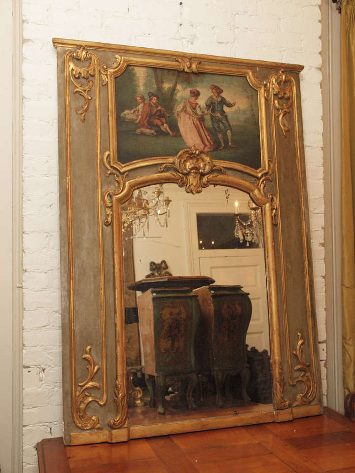 French 19th c. Painted and parcel gilt trumeau mirror with oil on canvas of frolicking dancers and musicians. 
appears to be original plate and finish. 