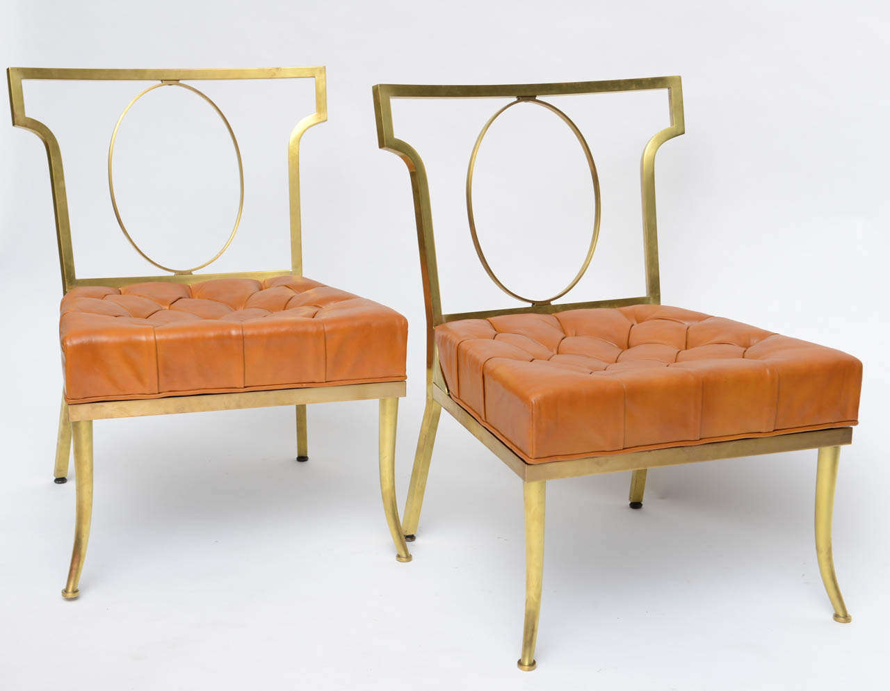Brass and Original Leather chairs exhibiting the interplay between positive and negative space.