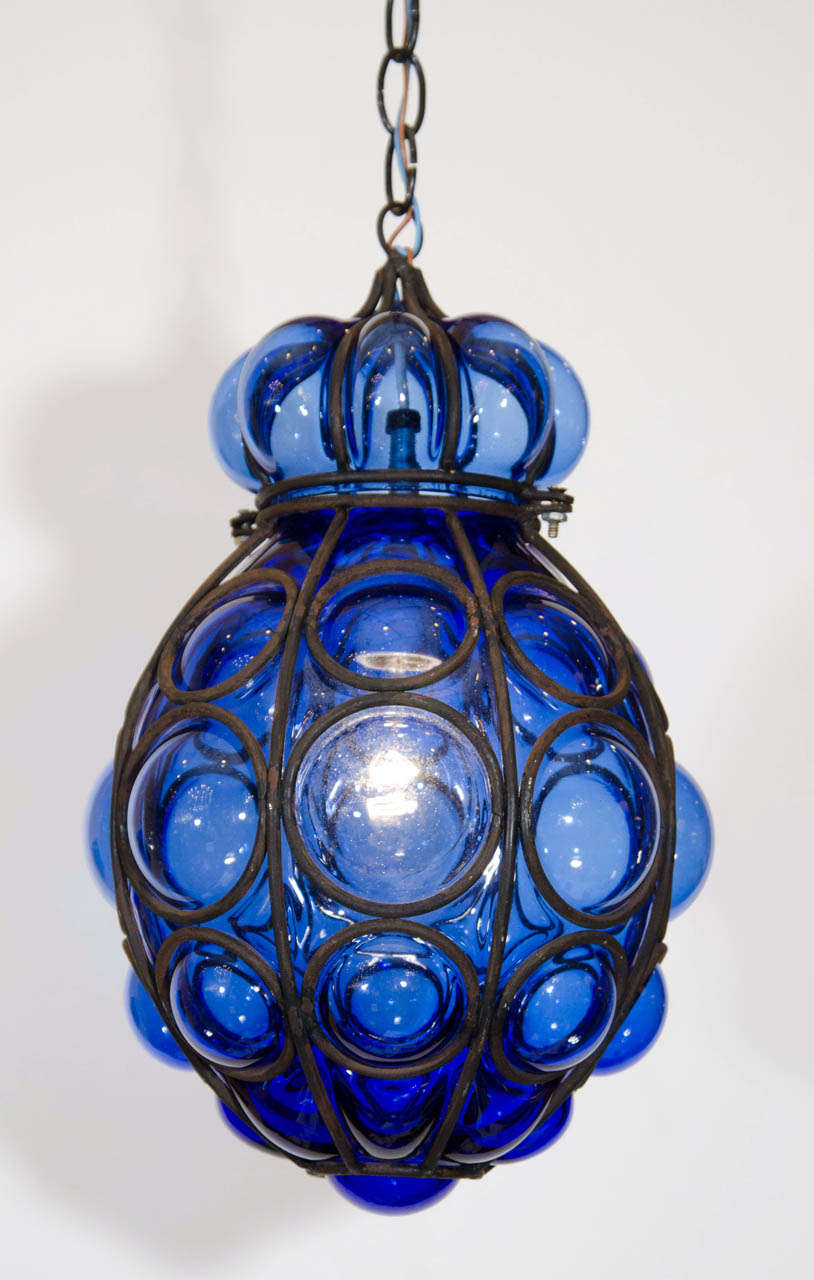 Beautiful, deep blue Seguso Murano caged glass pendant. Please contact for location.
