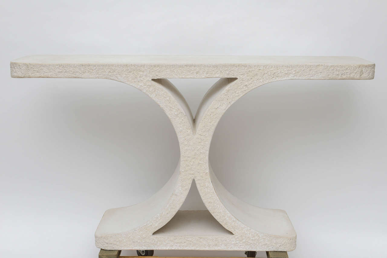 White cast stone console from the JMF Collection.