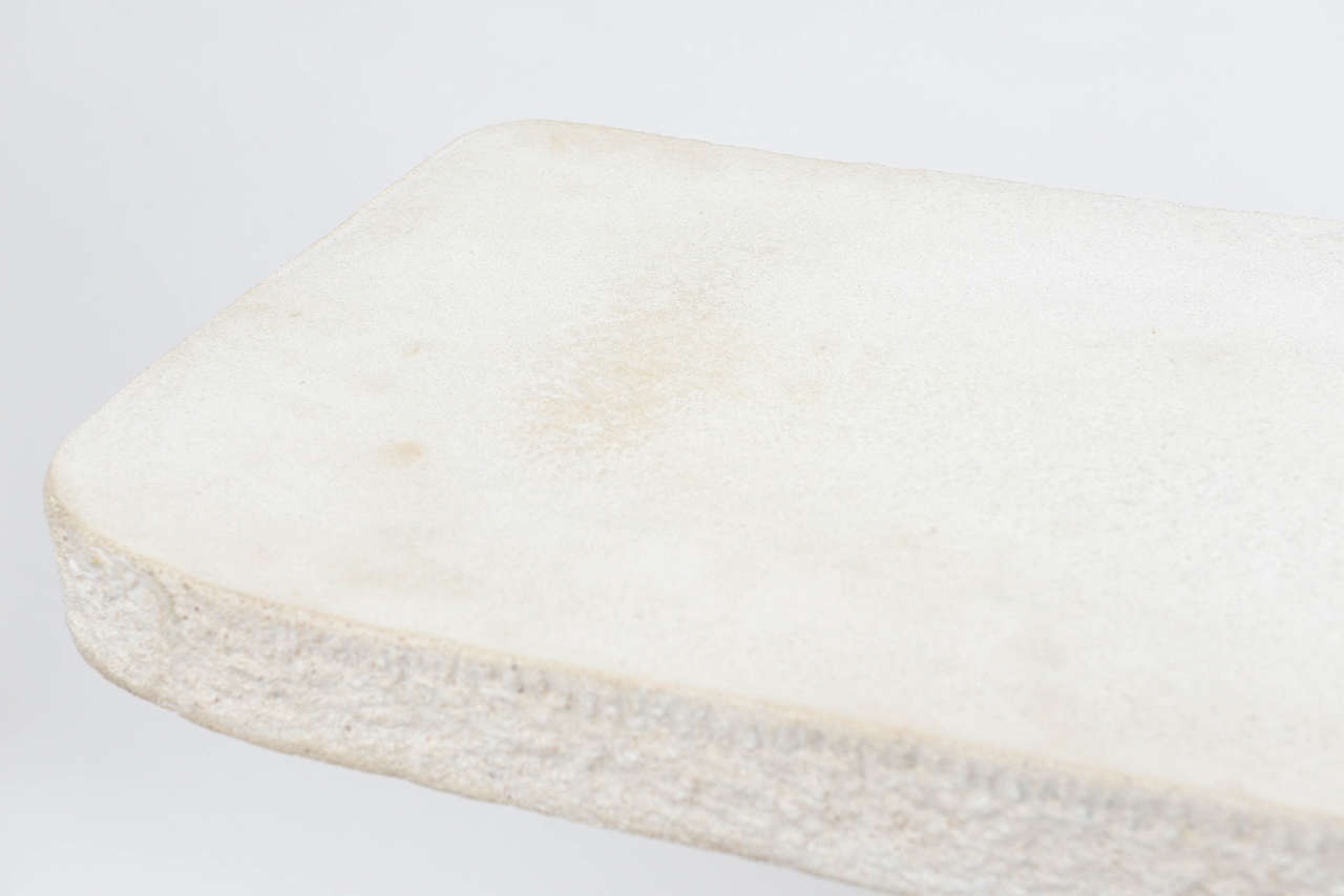 white stone console table