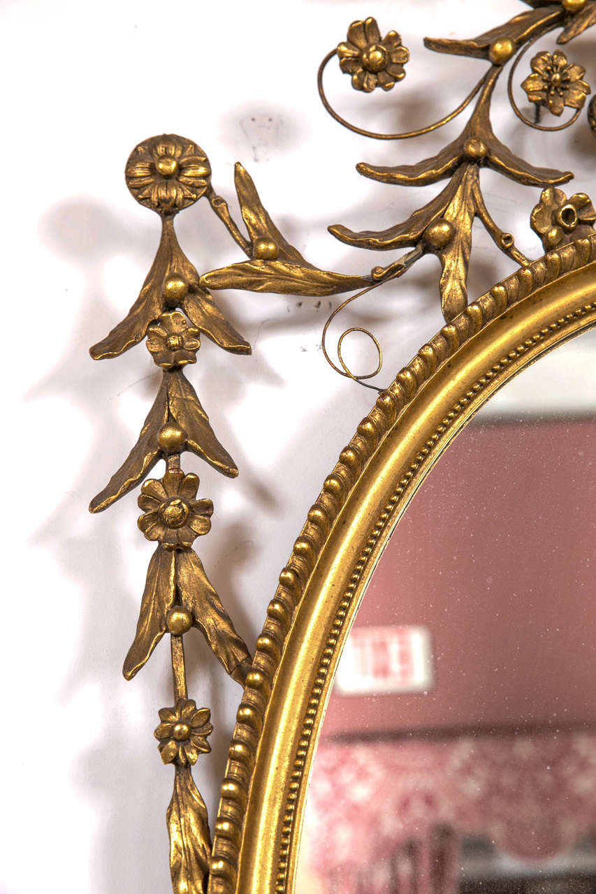 oval gilt mirror