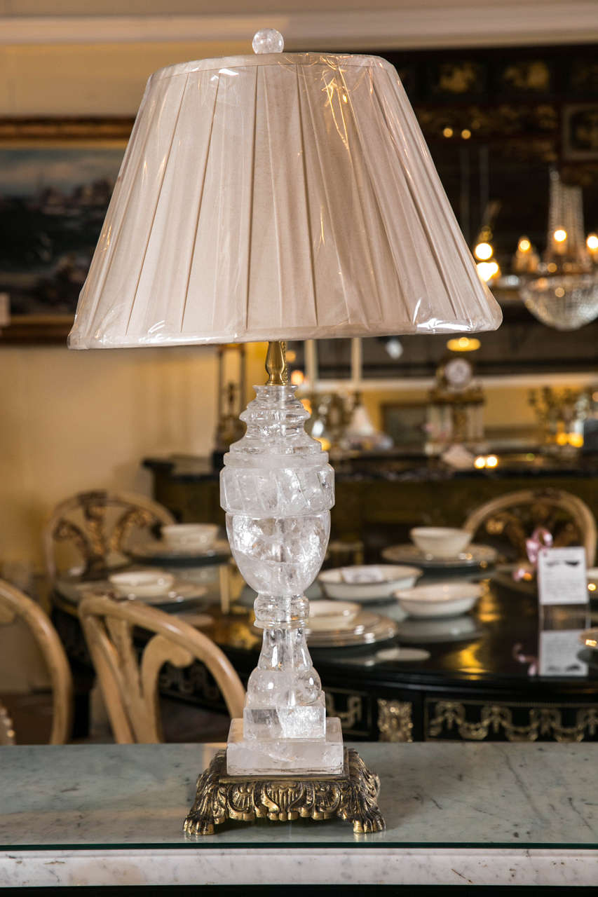 A fine rock crystal single column lamp on bronze base. Recently wired. Without shades.