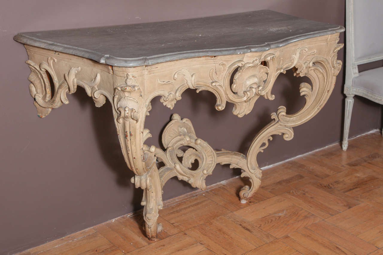 A Louis XV Style Painted Wood Console with Marble Top
France, 19th Century
