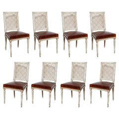 A Set of 8 Louis XVI Style Caned Back Painted Dining Chairs, France c. 1920