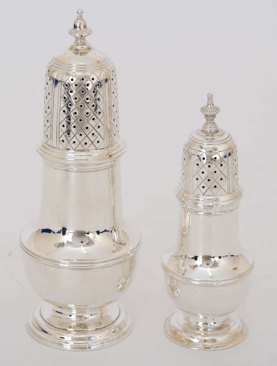 Mid-18th Century A Suite of Three George II Antique Silver Casters For Sale