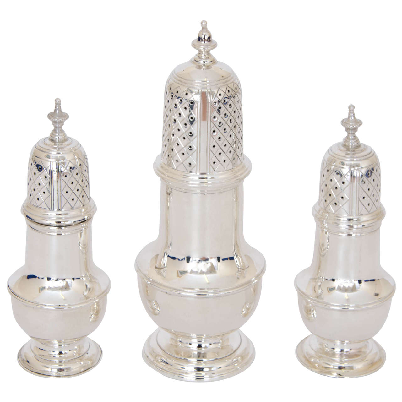 A Suite of Three George II Antique Silver Casters For Sale