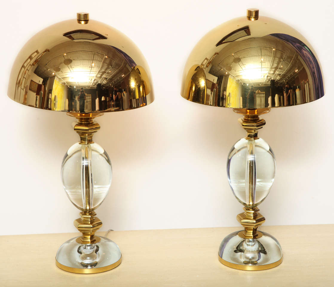 GABRIELLA CRESPI (b. 1922)
Pair of lamps with glass base and brass details and dome shade.
13