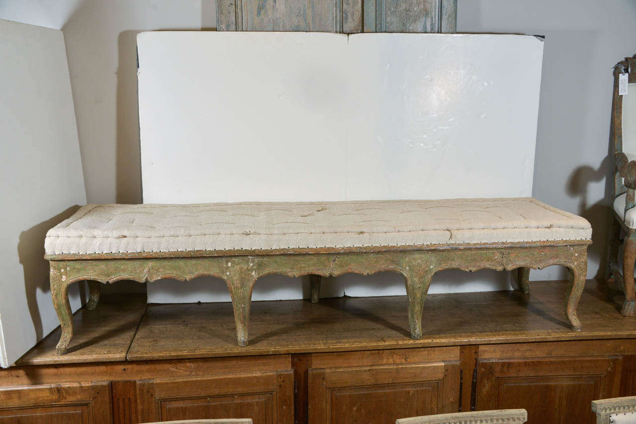 Fabulous painted Swedish rococo bench, upholstered in an antique hemp fabric.