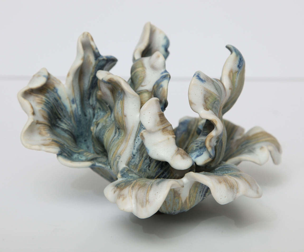 A glazed porcelain tulip by Matthew Solomon