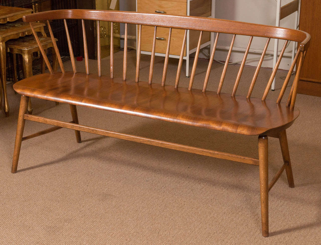 Some great lines on this Deacon's bench. Seating area is a molded plywood with the top layer being Teak, with legs and backrest Walnut. No markings but the previous owners parents owned a Danish furniture store in Washington state, where they said