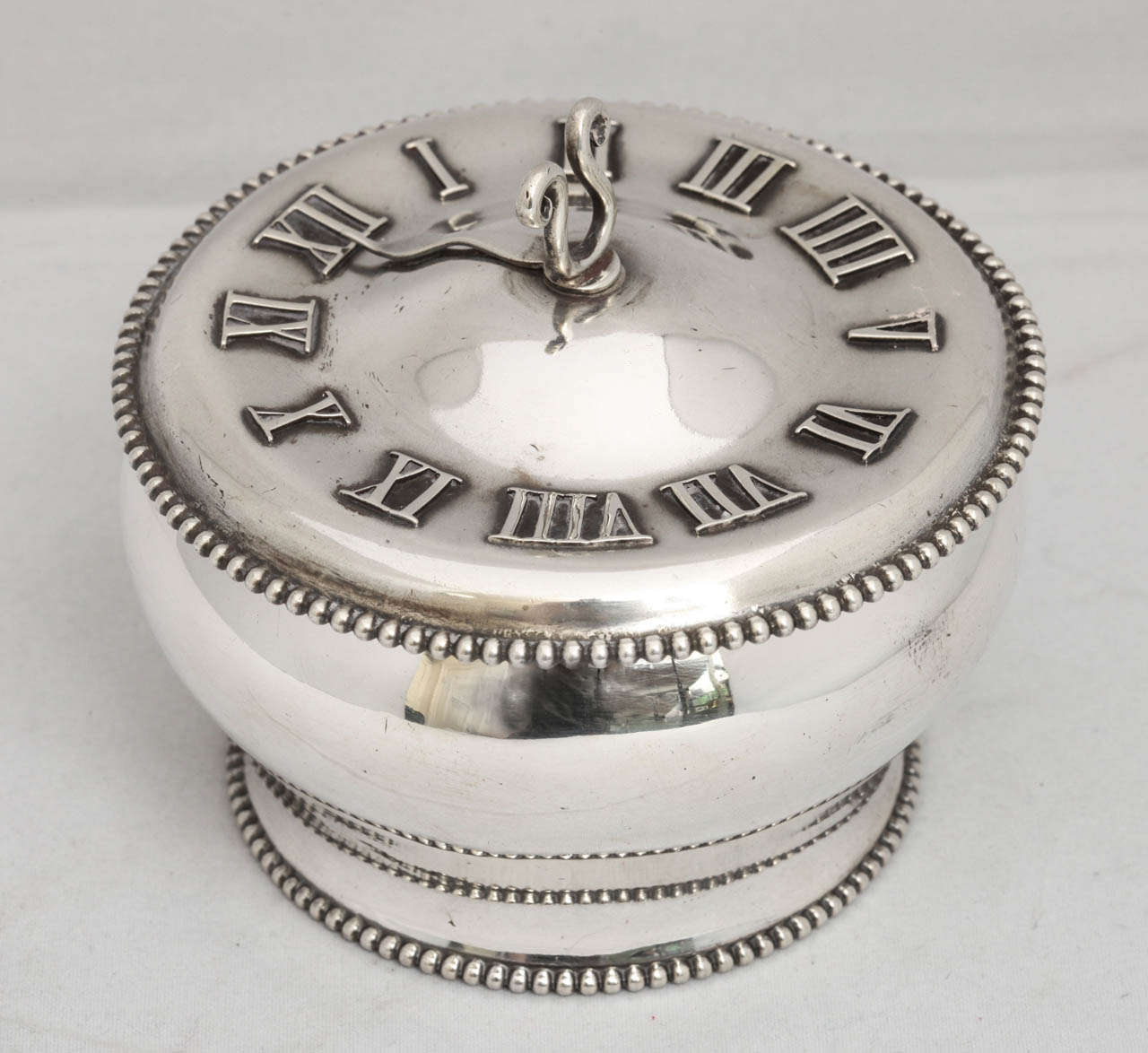 Victorian, very unusual, sterling silver round box with sundial on lid, The Gorham Manufacturing Co., Providence, Rhode Island, year marked for 1880. Sundial handle moves. Beaded borders; gilded interior. Measures: 3 3/4 inches; high (to top of lyre