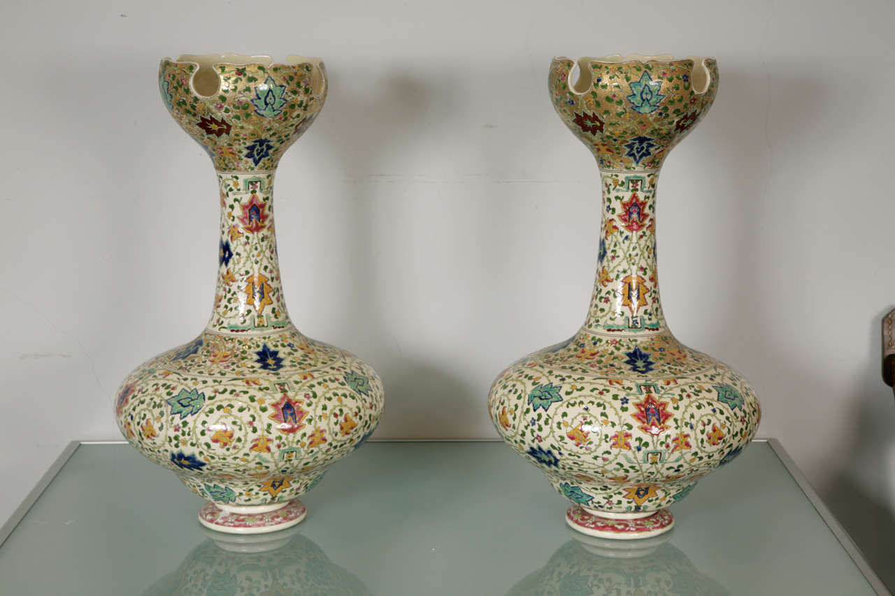 Decorated with bright polychrome Islamic style flowers, foliage and scrolls.
