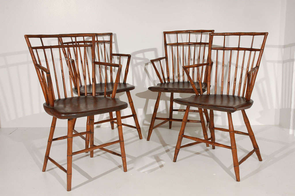 FANTASTIC & EARLY 19THC NEW ENGLAND SET OF FOUR BAMBOO TURNED BIRD CAGE WINDSOR ARM CHAIRS.THESE WONDERFUL SADDLE SEAT WINDSORS ARE VERY STRONG AND STURDY.THE CONDITION IS THE BEST AND THEY ARE SO CONFERTABLE TOO.TWO OF THE CHAIRS HAVE ROUNDED SEATS