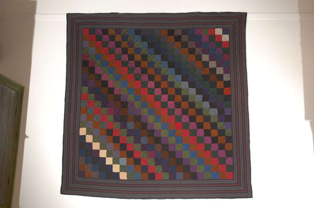 PENNSYLVANIA AMISH WOOL ONE PATCH OR STRAIGHT FURROWS FROM SUMMERSET COUNTY, PENNSYLVANIA.THIS ALL WOOL QUILT HAS GREAT GEM TONE COLORS.THE STRIPED BORDER IS WOOL CHALIS SUITING FABRIC AND UNUSUAL FOR THE AMISH TO USE IN THEIR QUILT MAKING.THIS IS