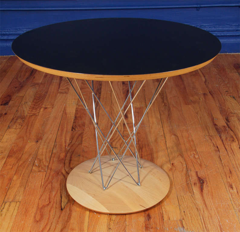 MODERNICA Cyclone Side Table designed by ISAMU NOGUCHI. Black laminate top on Birch Base with Noguchi's ever popular cyclone design pedestal in chrome.

