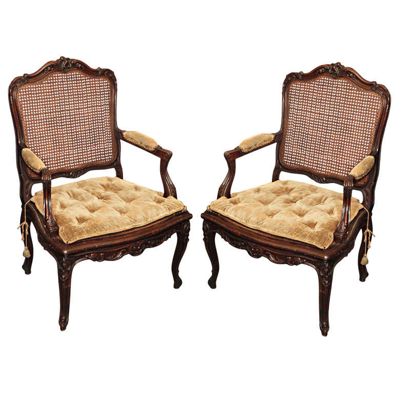 Pair Of Louis Xv Style Walnut Cane Armchairs For Sale