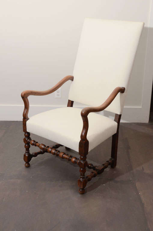 French Fauteuil with turned leg details and beautiful wood frame. Newly upholstered in white linen.
