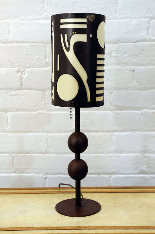 Highly stylized modernist table lamp designed by Karl Hagenhauer.<br />
Signed