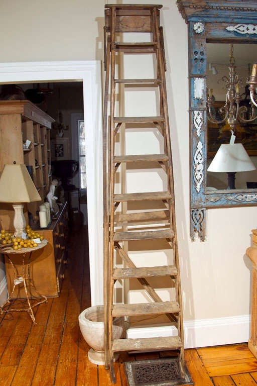 This 10-step wooden ladder is all original and a real beauty.  We had to almost tackle another dealer who was trying to buy it out from under us, but it was worth the effort!  This piece makes a wonderful display or book shelf in a contemporary