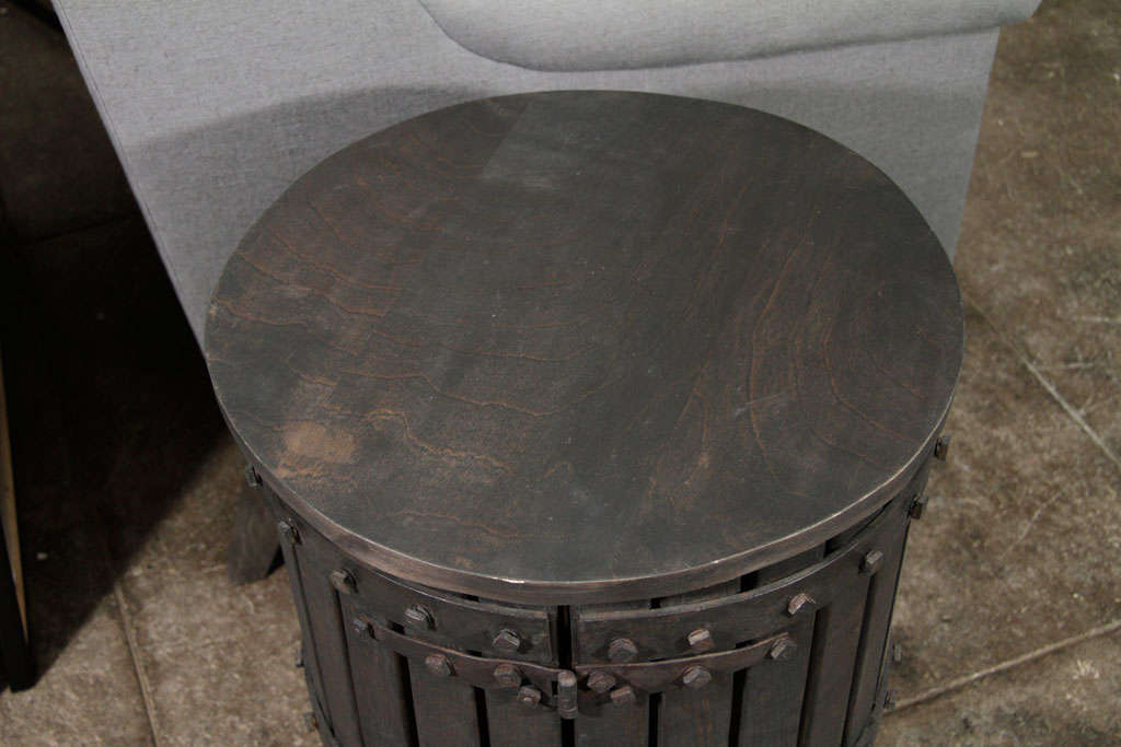 Blackened wood and metal barrel, makes beautiful side table.