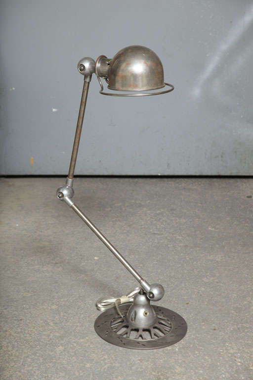 heavy iron industrial lamp from France.Height adjustable