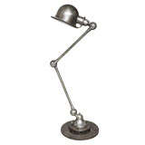 Vintage French industrial lamp with the name of the company on it