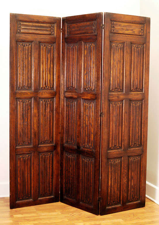 Early 20th C. Drapery Motif Tri-fold Oak Screen<br />
<br />
If you send an inquiry to us and do not receive a response, please contact us directly at 202-333-4663.