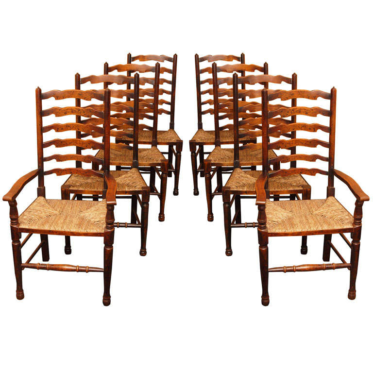 Set of eight English oak ladderback rush seat Lancashere chairs at 1stDibs