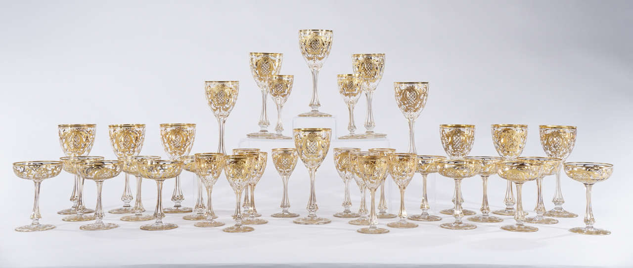 Fit for a King, this rare 36-piece set is one of the most elegant and elaborately decorated stemware services available. Elevate your table with this complete service consisting of 12 water goblets, 12 wines and 12 champagnes, all useful sizes. The