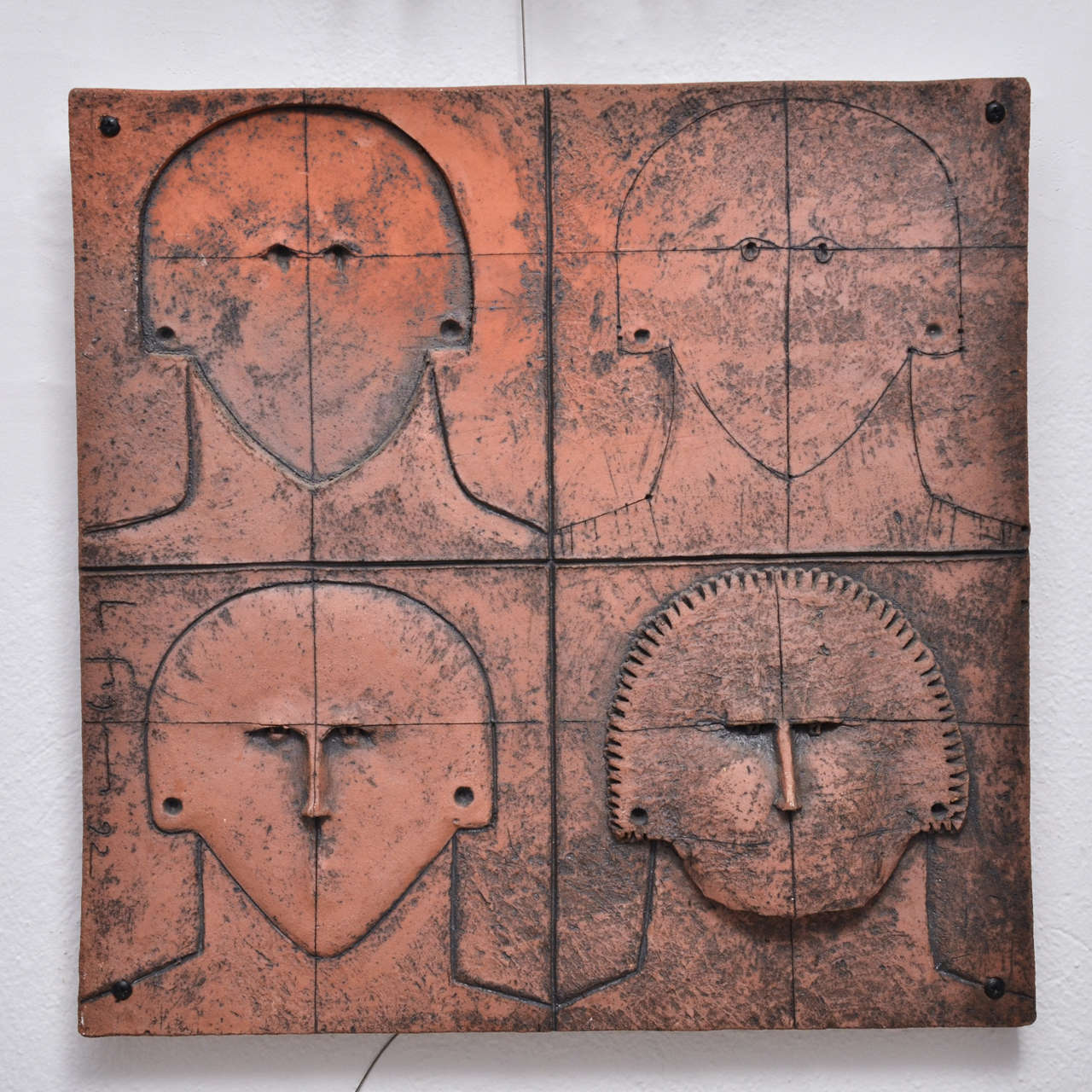 Terracotta "Faces" Wall Applique by Lucia Figueroas