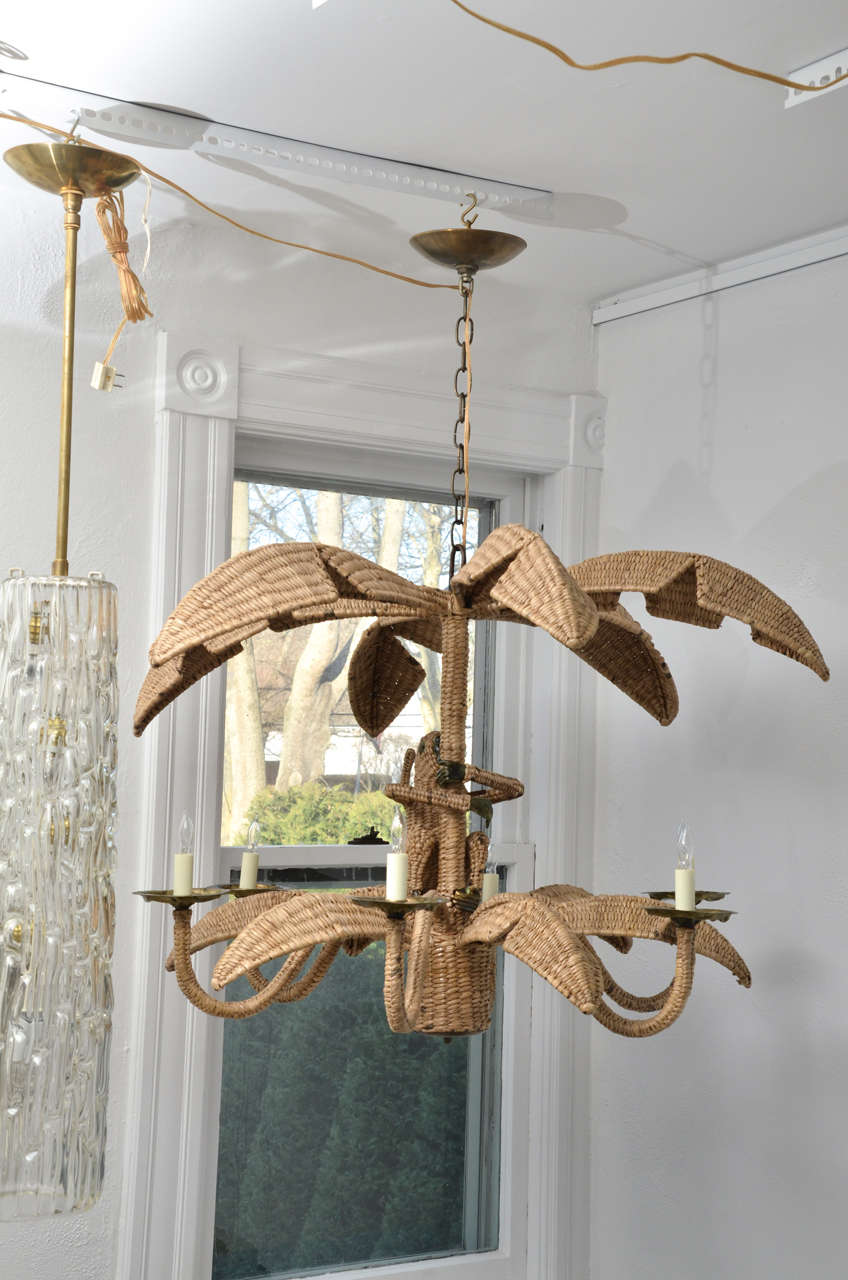 Whimsical wicker and mixed metal chandelier by Mario Lopez Torres for Tzumindi.