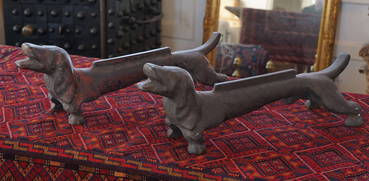 Nice pair of American cast iron Dachshund boot scrapes with original finish. Circa 1950. Adorable.