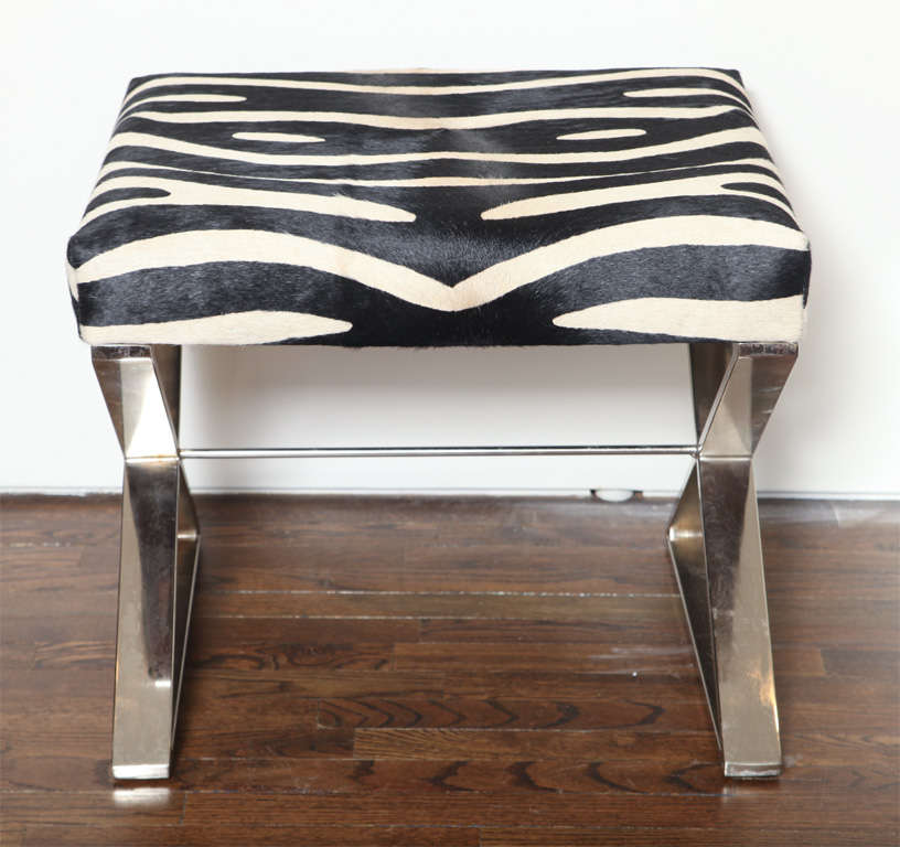 Pair of Pony Skin Covered Chrome X Base Stools