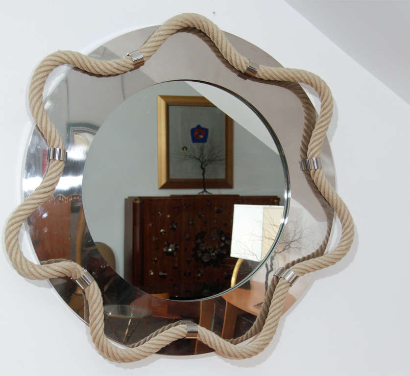Round contemporary mirror designed by Thomas Boog<br />
& executed by Pouenat Ferronnier, Moulins, France