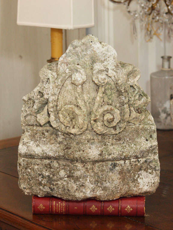 Unique 18th century architectural stone fragment with intricate hand carvings. Very heavy and full of character.