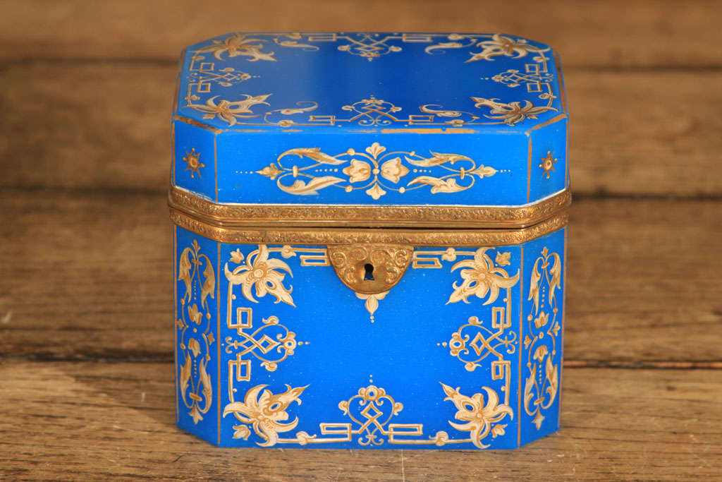 A very nice French opaline decorative box or casket decorated with applied gilt tracery.