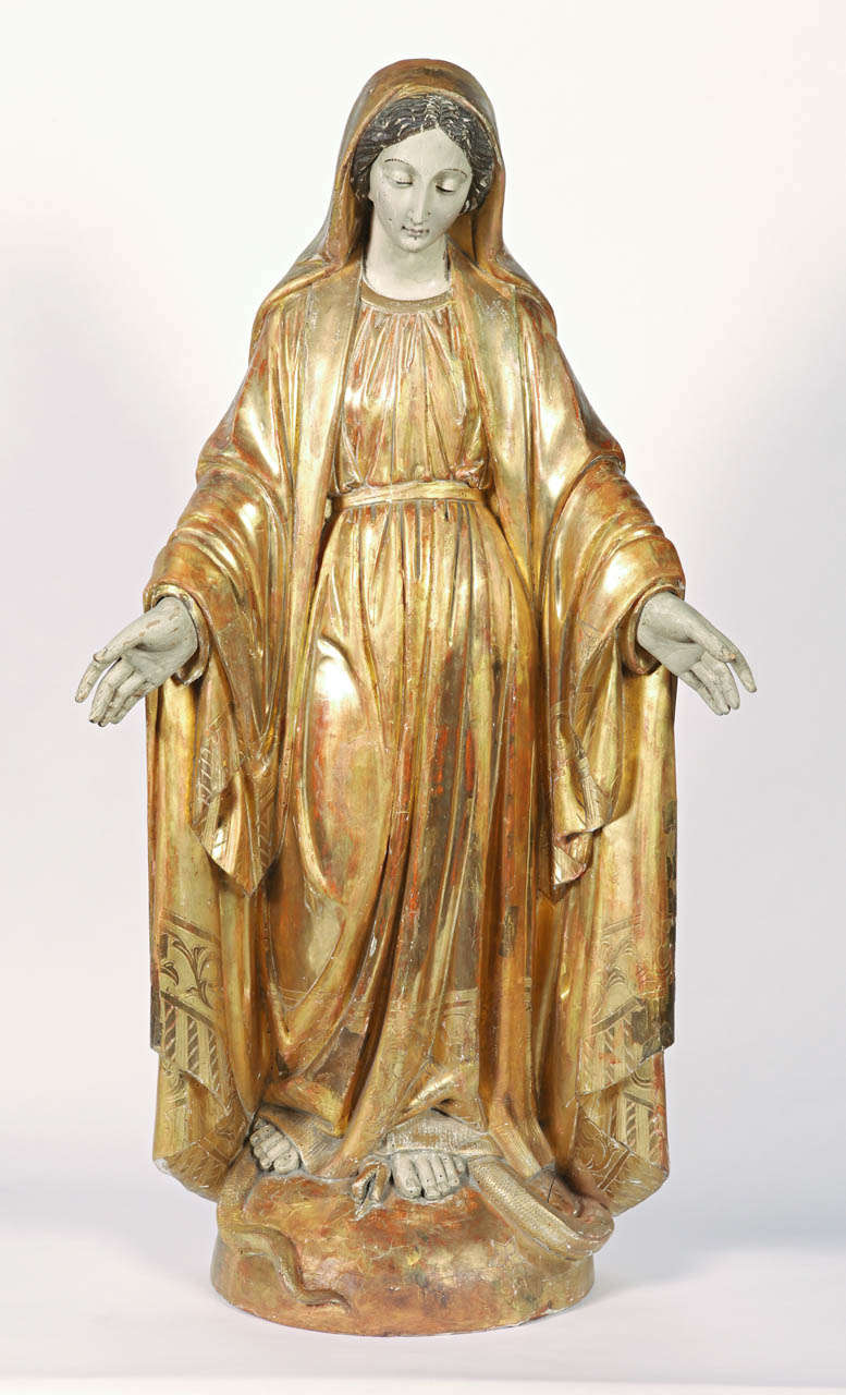 Beautiful 18th century hand carved statue of the Virgin Mary.  She is depicted standing on a globe and crushing the serpents head as referenced in the book of Genesis 3:15:  