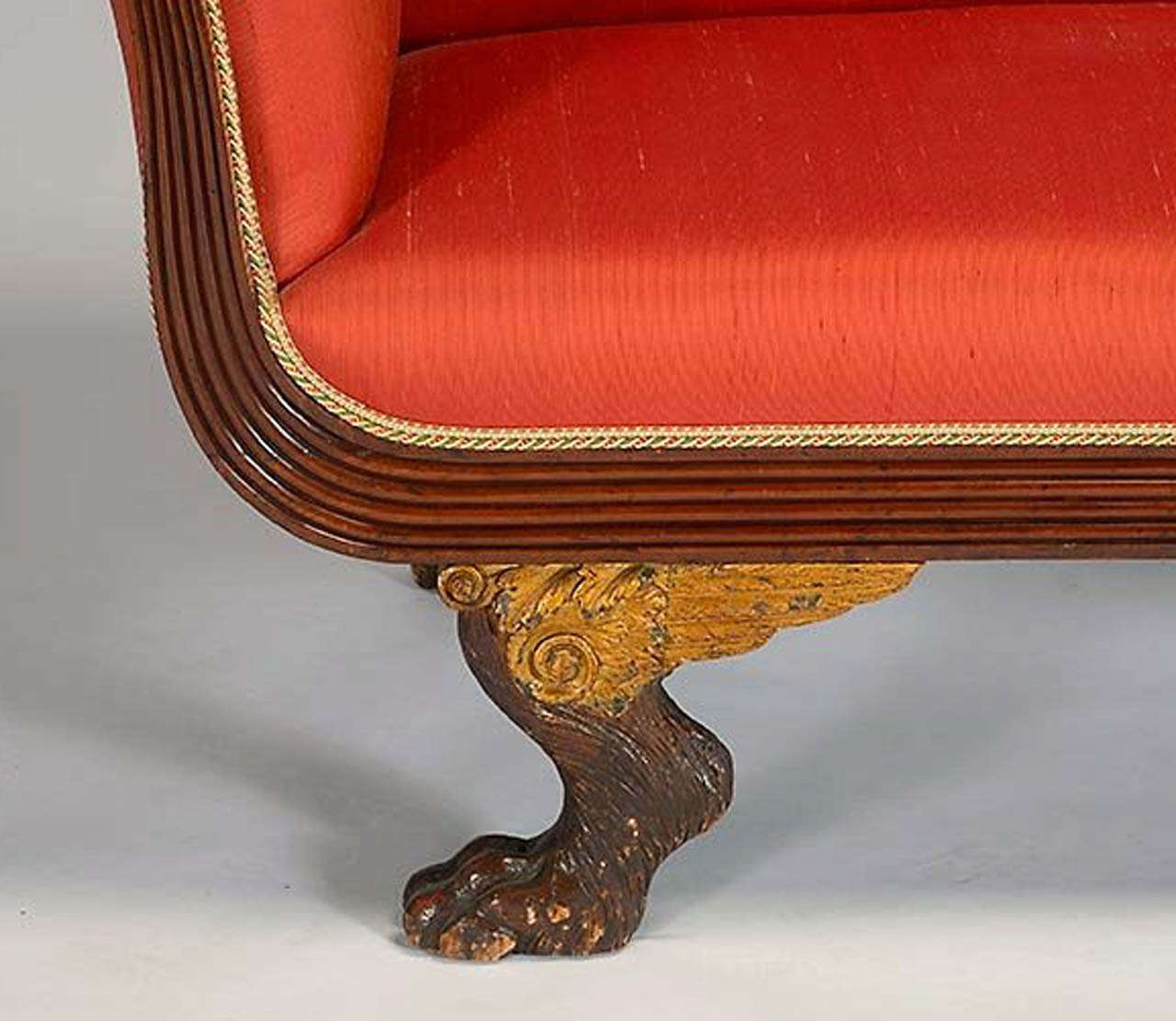 Rare and original 1816 New York classical mahogany settee most certainly attributed to the workshop of renowned New York City cabinetmaker Duncan Phyfe. This example is the upholstered 'short' settee version of the 'Grecian' caned sofa made by Phyfe