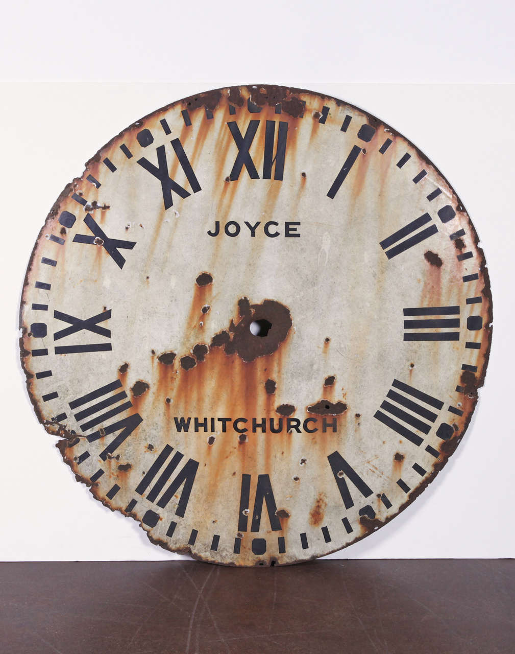 English role clock face.
Antique clock face in original paint patina,
circa 1900.
Can be placed indoor or outdoor.

The clock is from J. B. Joyce & Co, claim to be the oldest clock manufacturer in the world, originally established in 1690. The