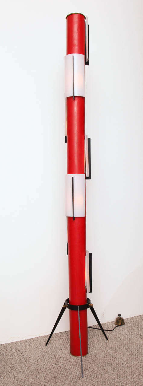 Rare example of a super unusual design.  Red and black painted metal totem form with opaque, white perspex diffusers, and polished brass mounts.  All metal elements remain in original condition and all sockets and wiring are new.  This lamp has