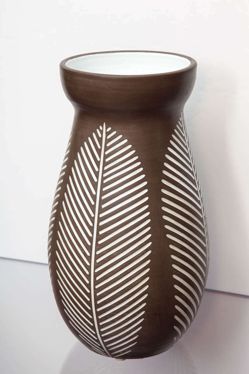 Large-scale ceramic vase by Zaccagnini.  Hand-thrown earthenware vase. Brown and white glazes with incised leaf pattern and interior glaze. Beautiful graphic piece with great scale. Signed on bottom.
