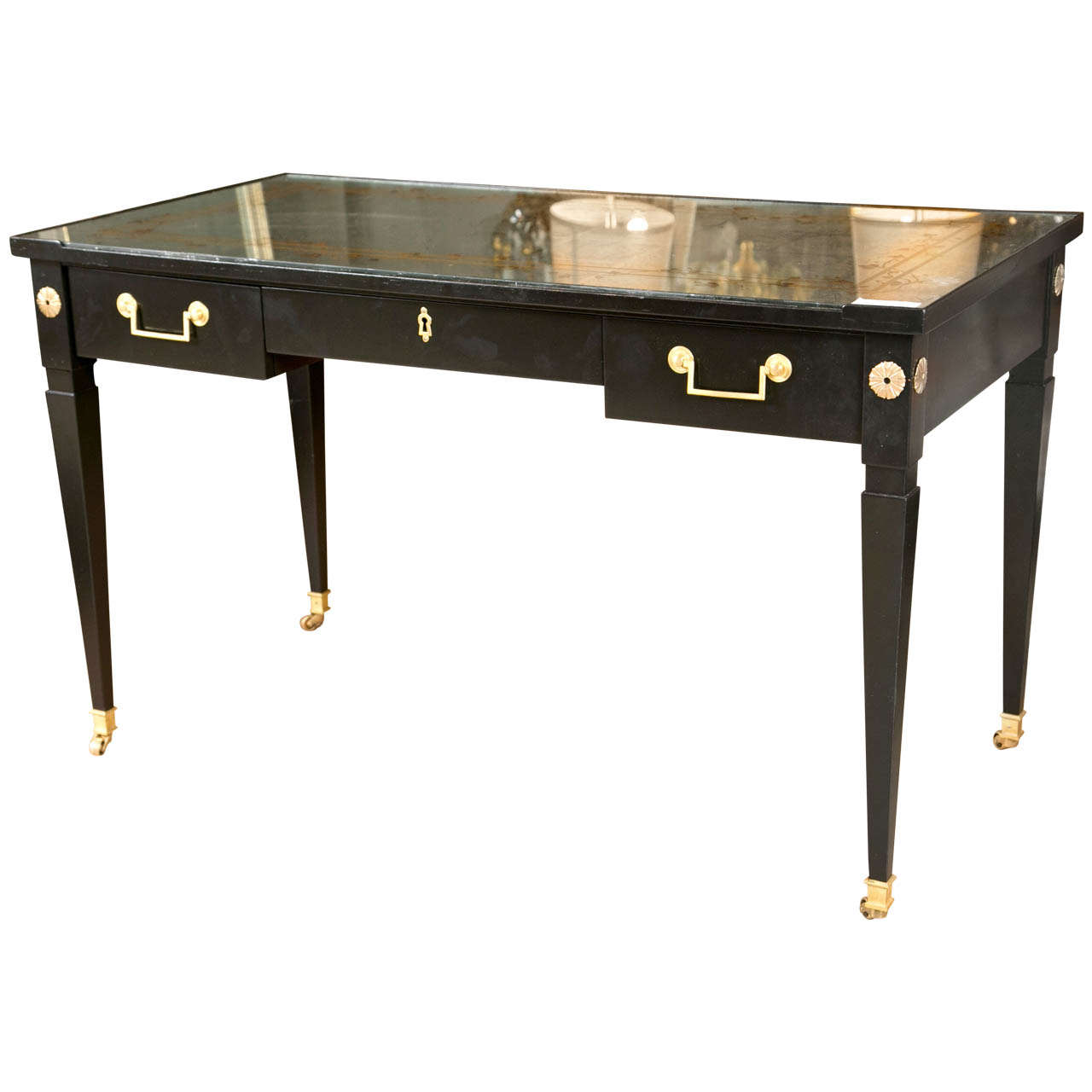 An Ebonized Eglomise Top Desk attributed to Maison Jansen