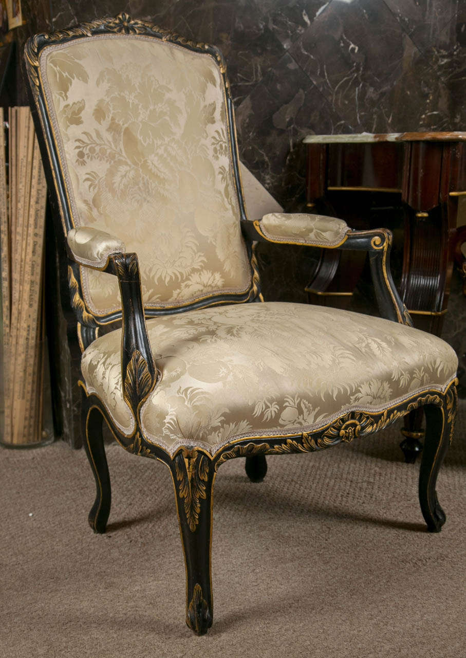 Mid-20th Century Pair of French Fauteuils Louis XV Style Armchairs Ebonized And Parcel Gilt