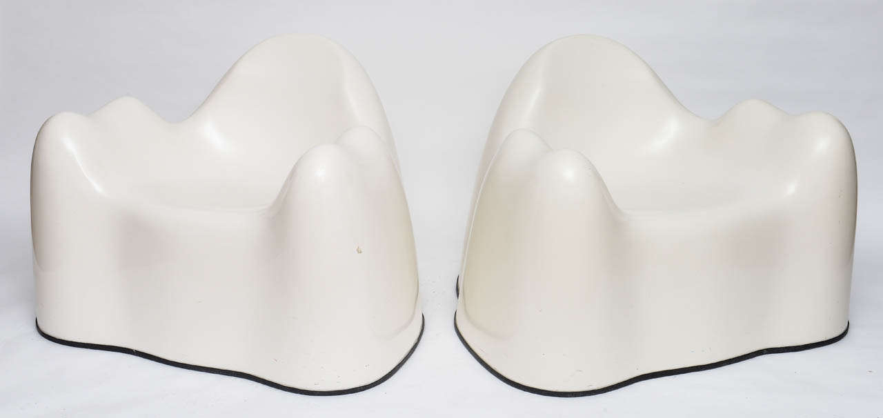 Pair of Wendell Castle Molar Group arm chairs in fiberglass.
