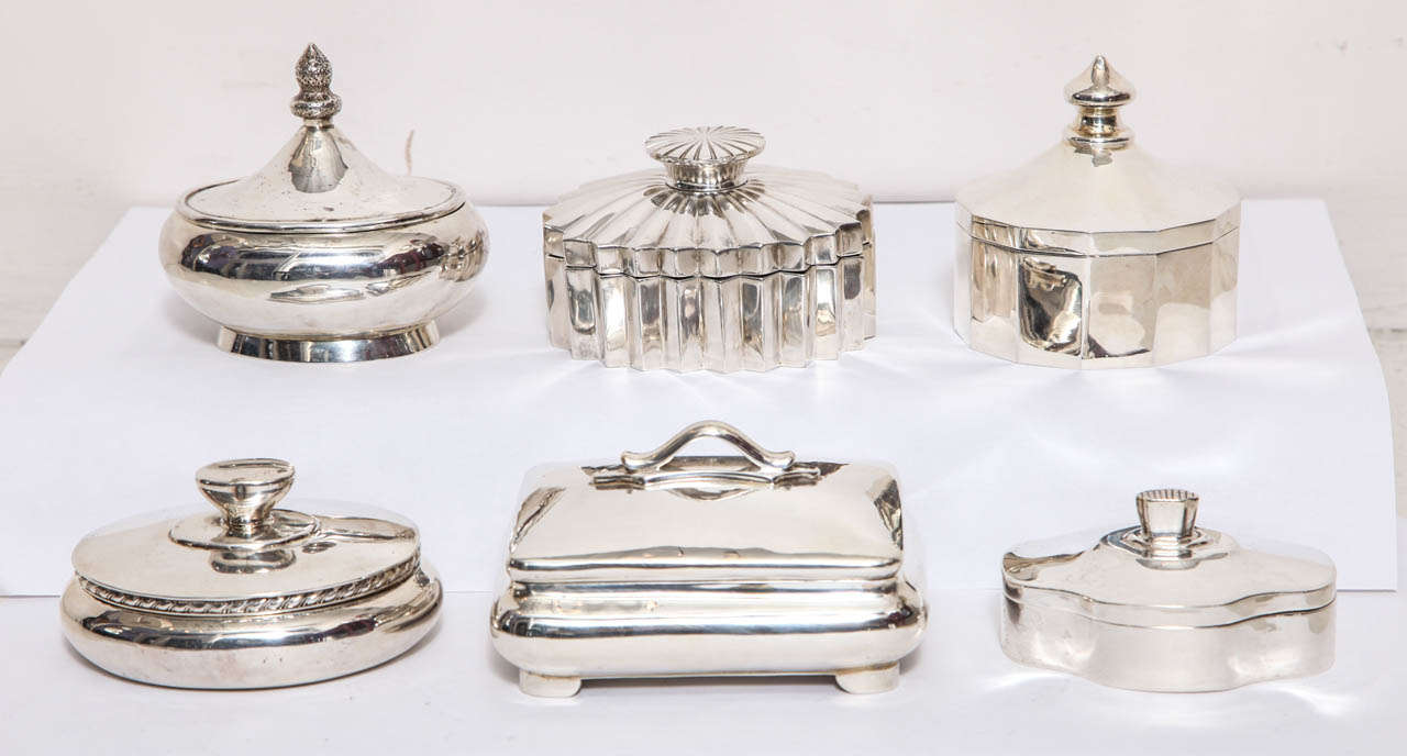 WILLIAM SEITZ                                                       
Six hand-wrought sterling silver boxes in various profiles.    
Some have gilded interiors.
All signed and marked: W SEITZ   Sterling   Handwrought                              
