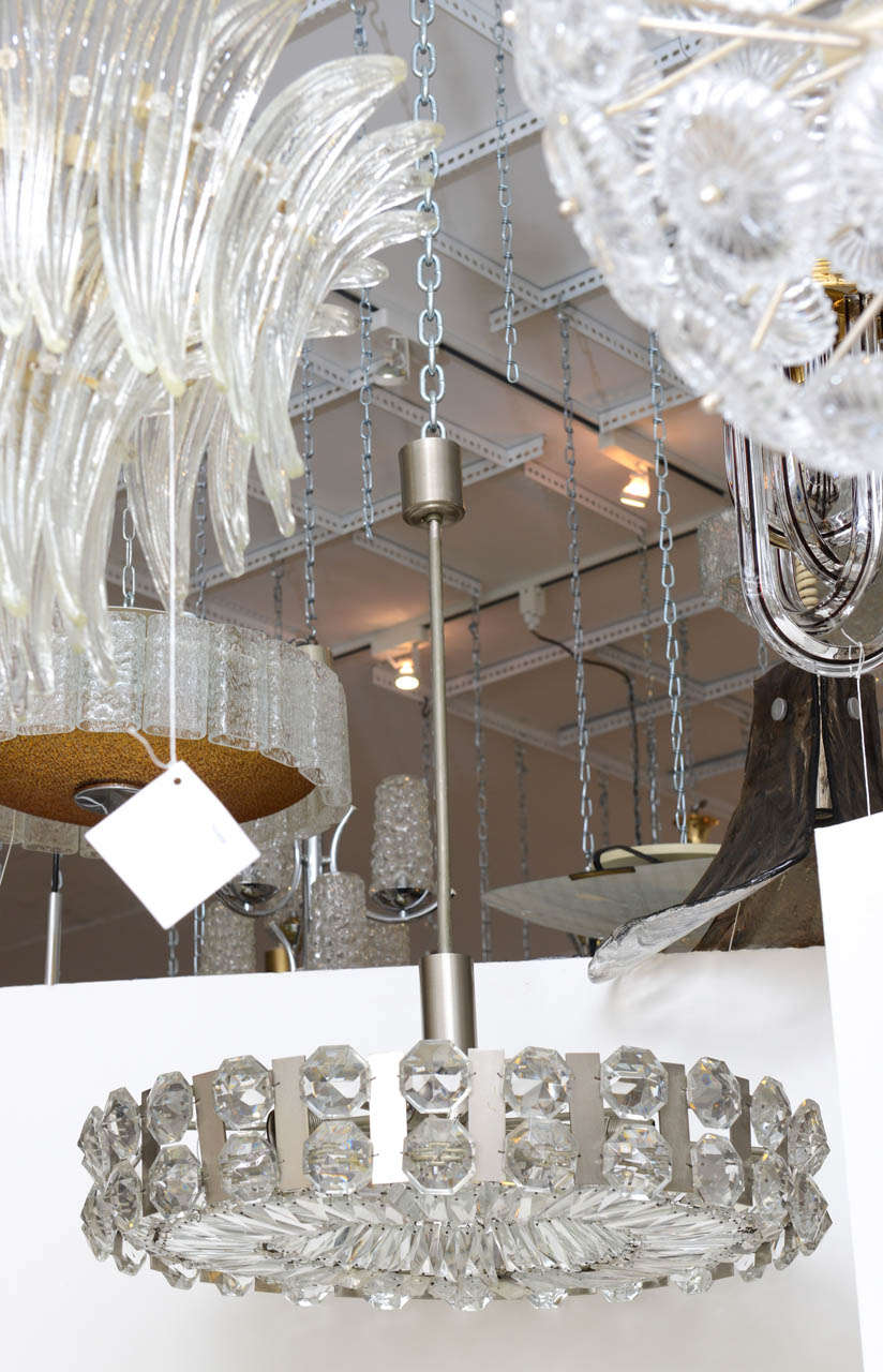 Dramatic large steel and faceted glass mod European  light fixture.  Gives a very glamorous feel.

Price reduced from $4800.